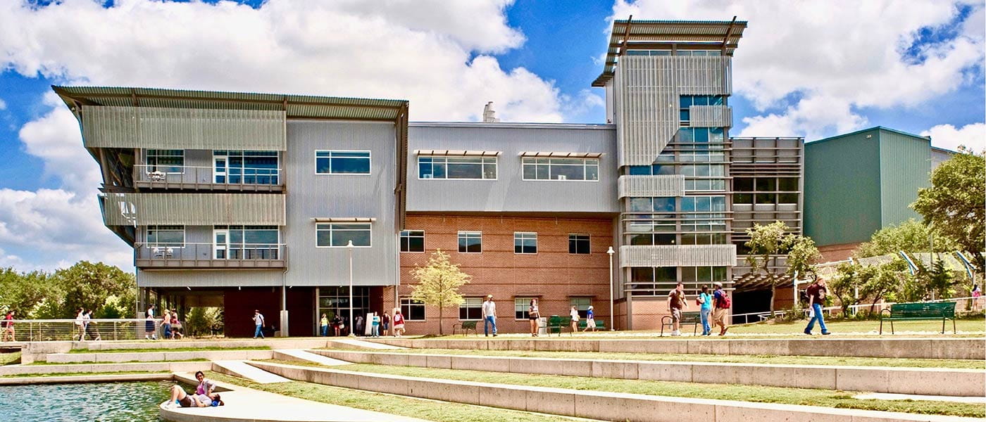 a building with people walking around