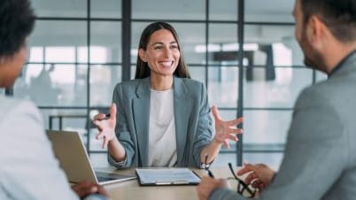 a person talking to a group of people a person talking to a group of people