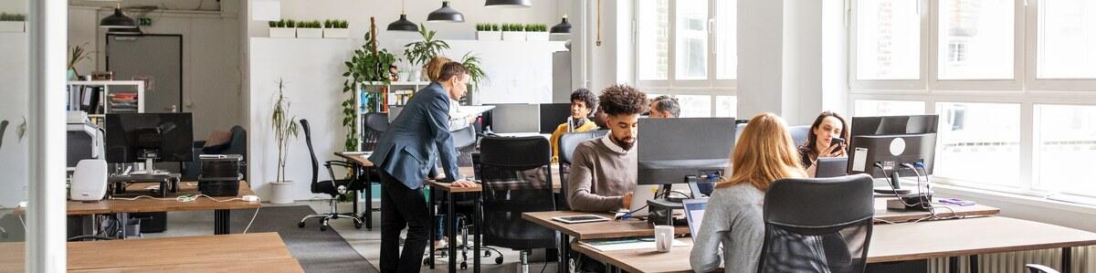 a group of people sitting at a table a group of people sitting at a table