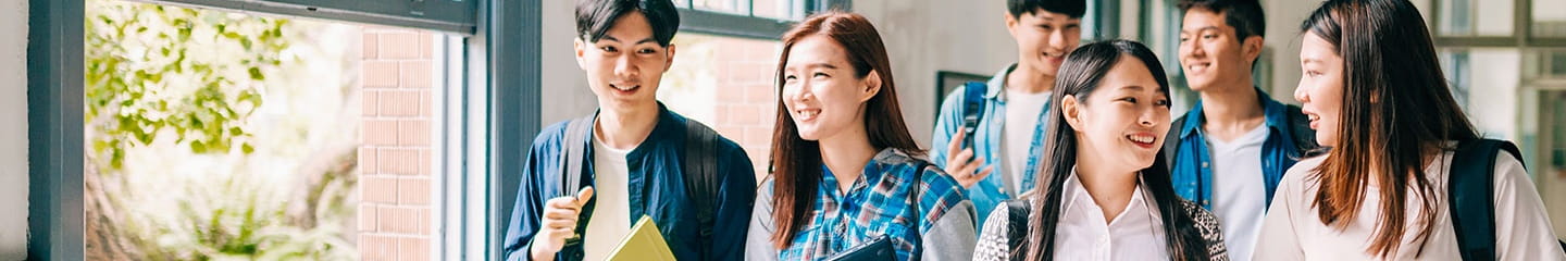 a group of people standing outside a building