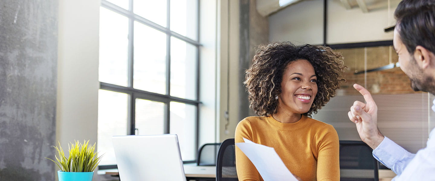 a woman and a man talking