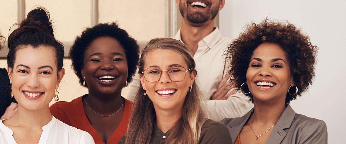 Jaqueline Fleming and a group of smiling people