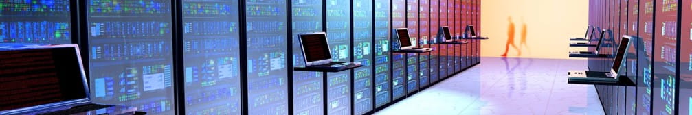 a room with computers and people