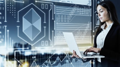 a woman working on a laptop a woman working on a laptop