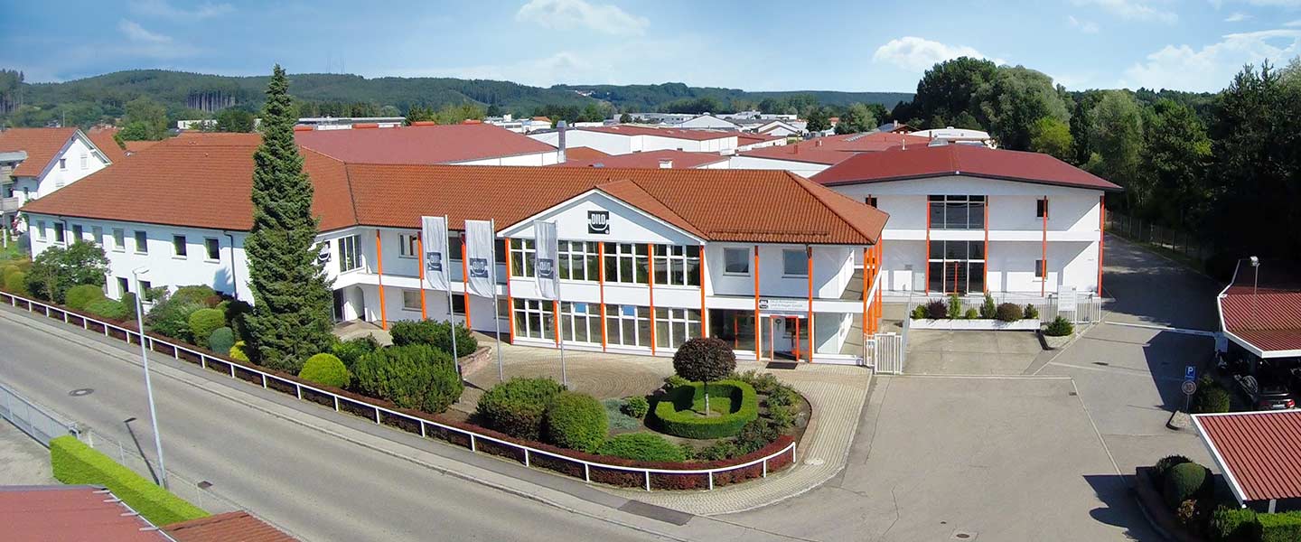 a large building with a parking lot