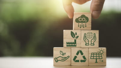 A hand and some building blocks. A hand and some building blocks.