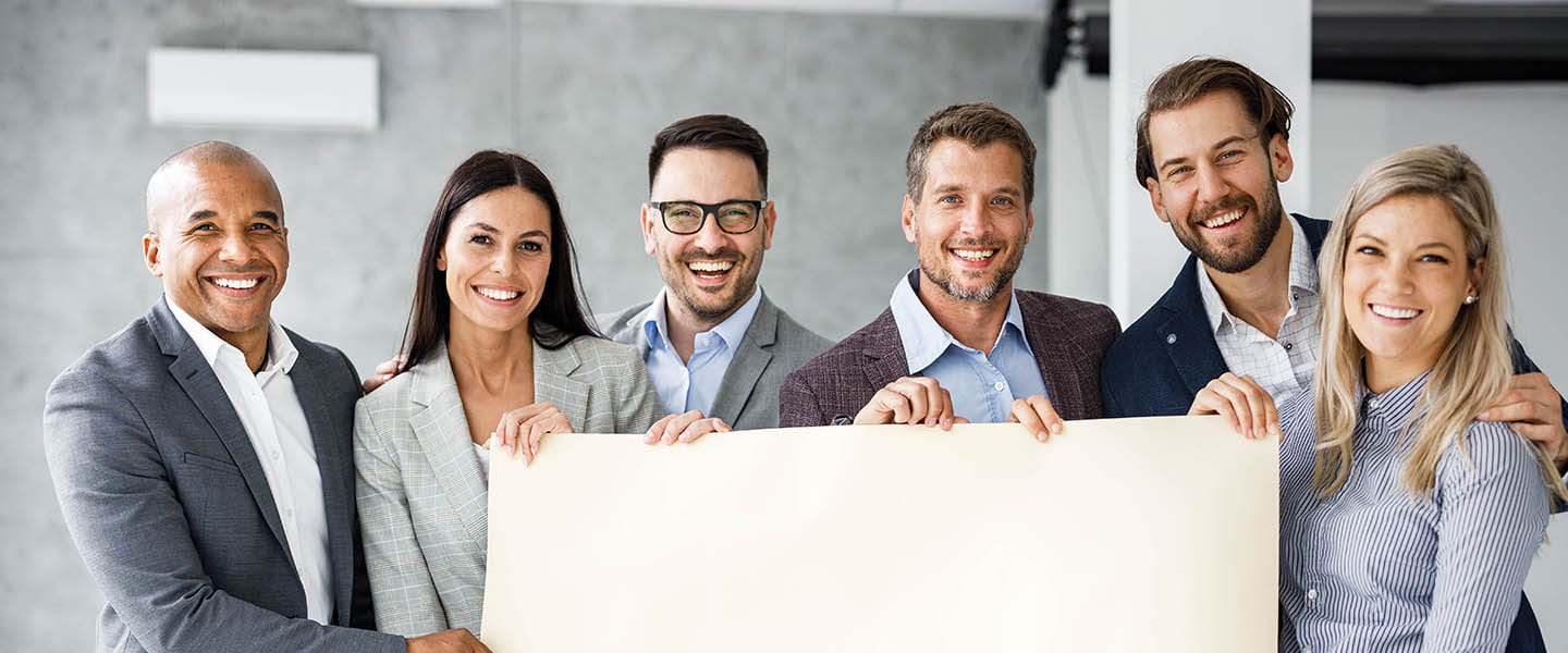 A group of people smiling.