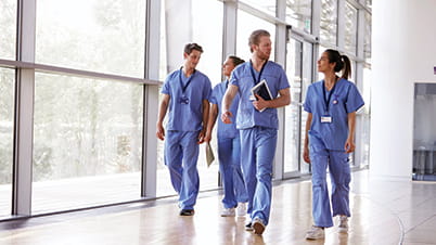 Doctors walking in hallway Doctors walking in hallway