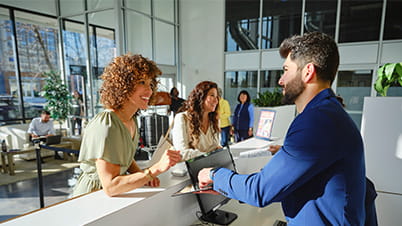 Guest at hotel service desk Guest at hotel service desk