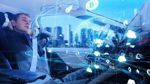 Man sleeping in driverless car for blog post