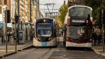 A tram and a bus A tram and a bus
