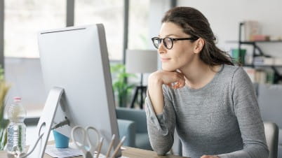 a woman sitting at a desk