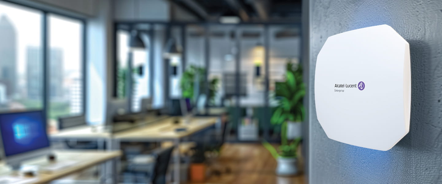 image of an office with an OmniAccess Stellar access point Wi-Fi 7 on the wall