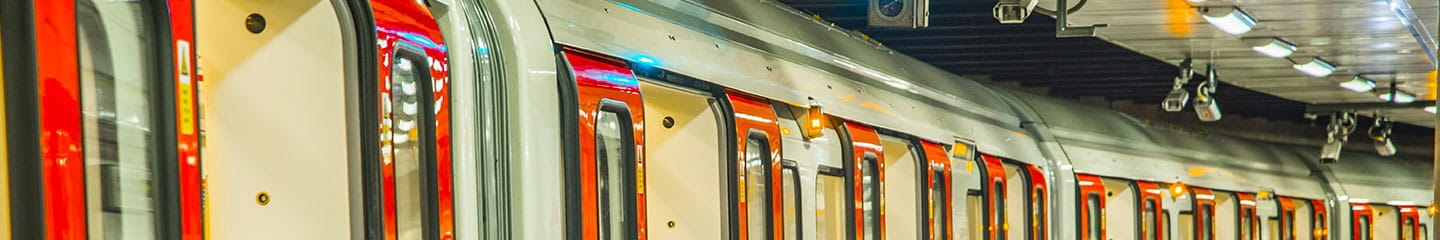 a train with red and white doors