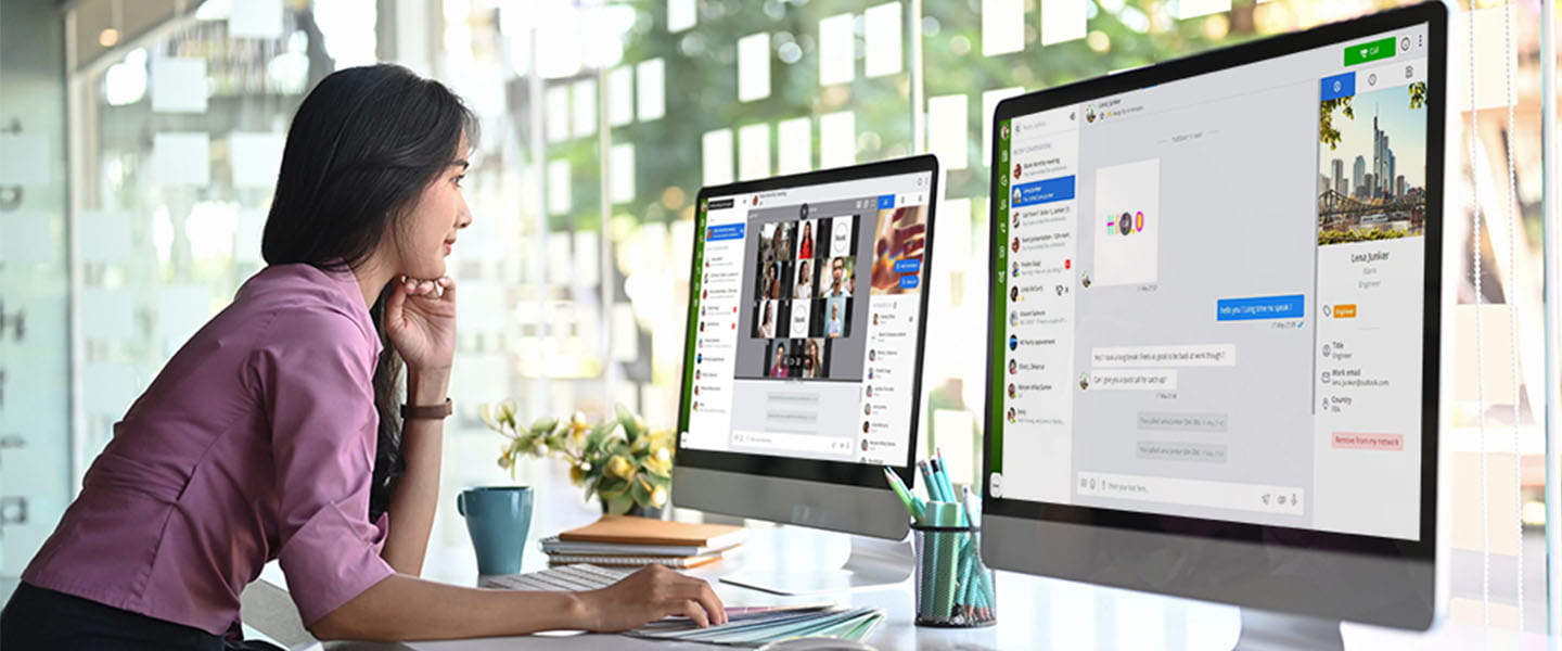 a woman looking at a computer screen